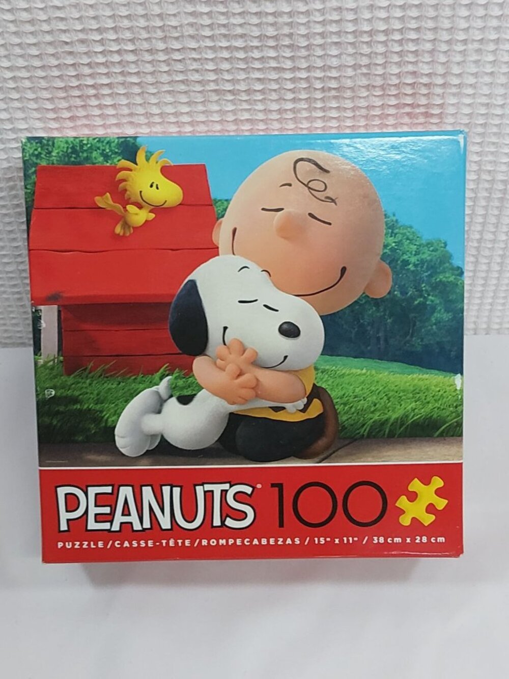 Peanuts 100-Piece Puzzle Snoopy & Charlie Brown Hugging 15"x11" NIB